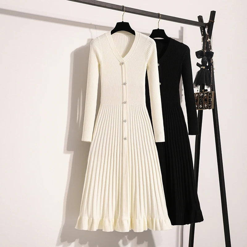 Robe mi-longue côtelé avec boutons bijoux