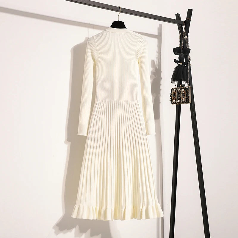 Robe mi-longue côtelé avec boutons bijoux