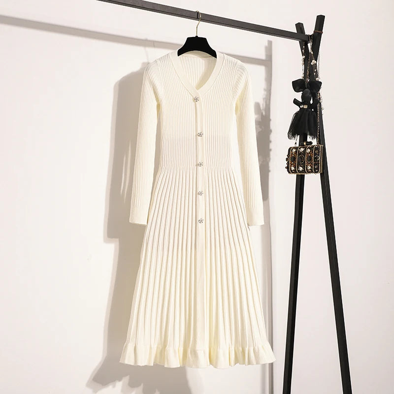 Robe mi-longue côtelé avec boutons bijoux