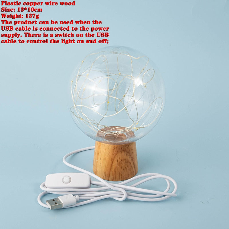 Lampe boule de cristal et guirlande